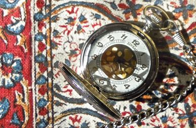 Karen McCann, stopwatch showing time