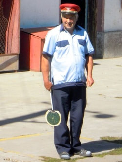 Hungarian Railwayman / Trains for Carbon-Conscious Travelers / Karen McCann / EnjoyLivingAbroad.com
