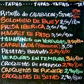 Seville tapas bar menu, Karen McCann, Enjoy Living Abroad