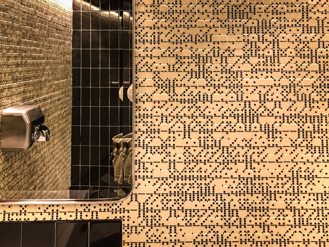 Domino effect bathroom tiles / Bar Castio / 3 Food Tribes of Seville, Spain / Karen McCann / EnjoyLivingAbroad.com