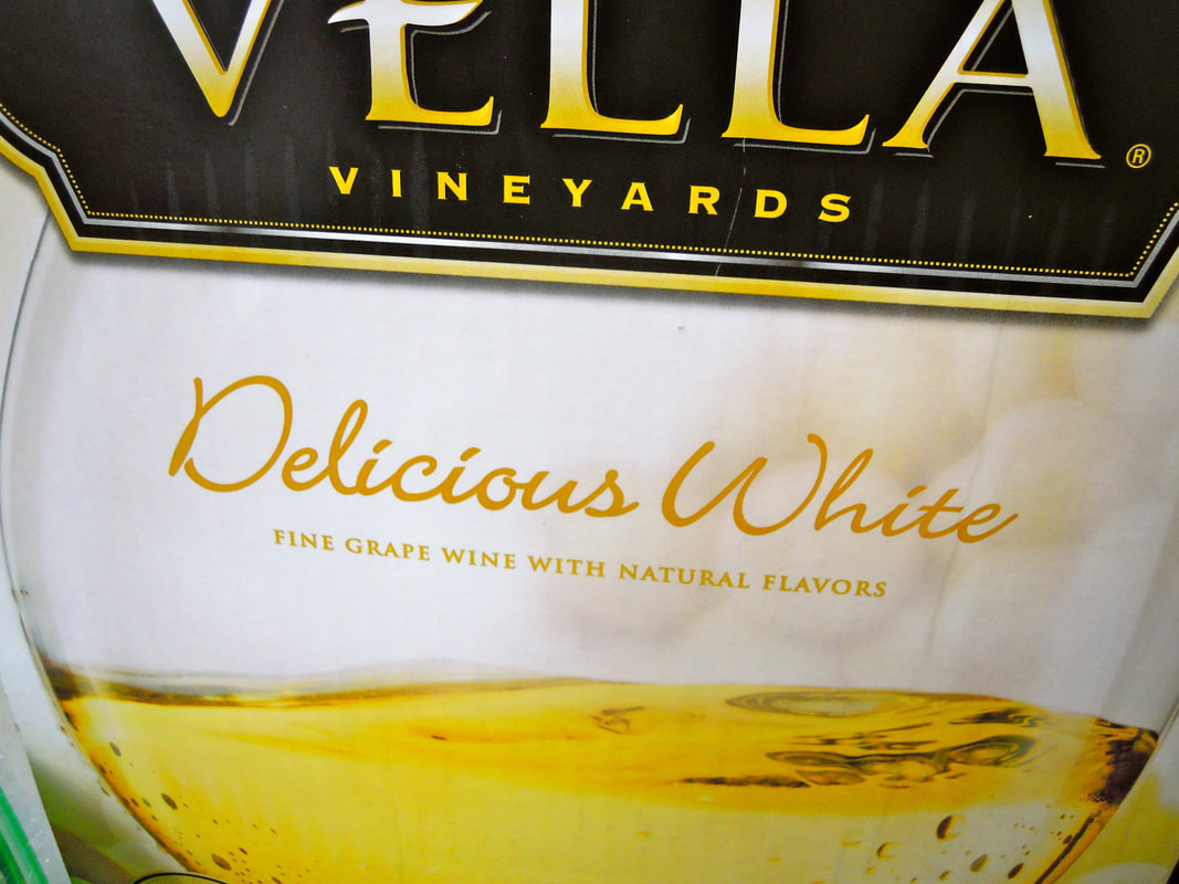 Dive Bar Survival Guide / white wine served at dive bar / Karen McCann / enjoylivingabroad.com