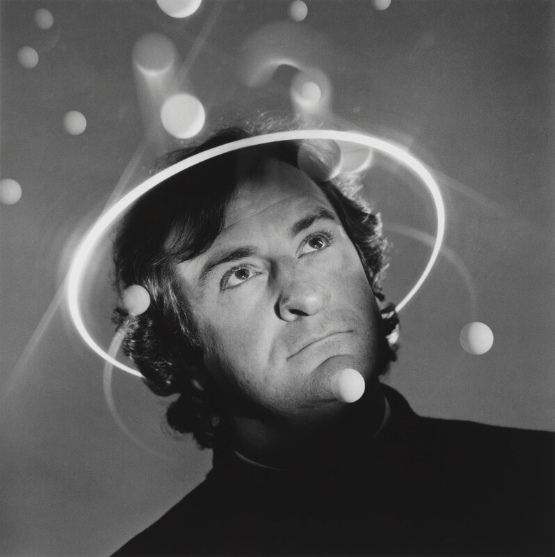 Douglas Adams / Re-entry & Re-opening / Bizarre & Inexplicable: The World of Karen / Karen McCann / EnjoyLivingAbroad.com