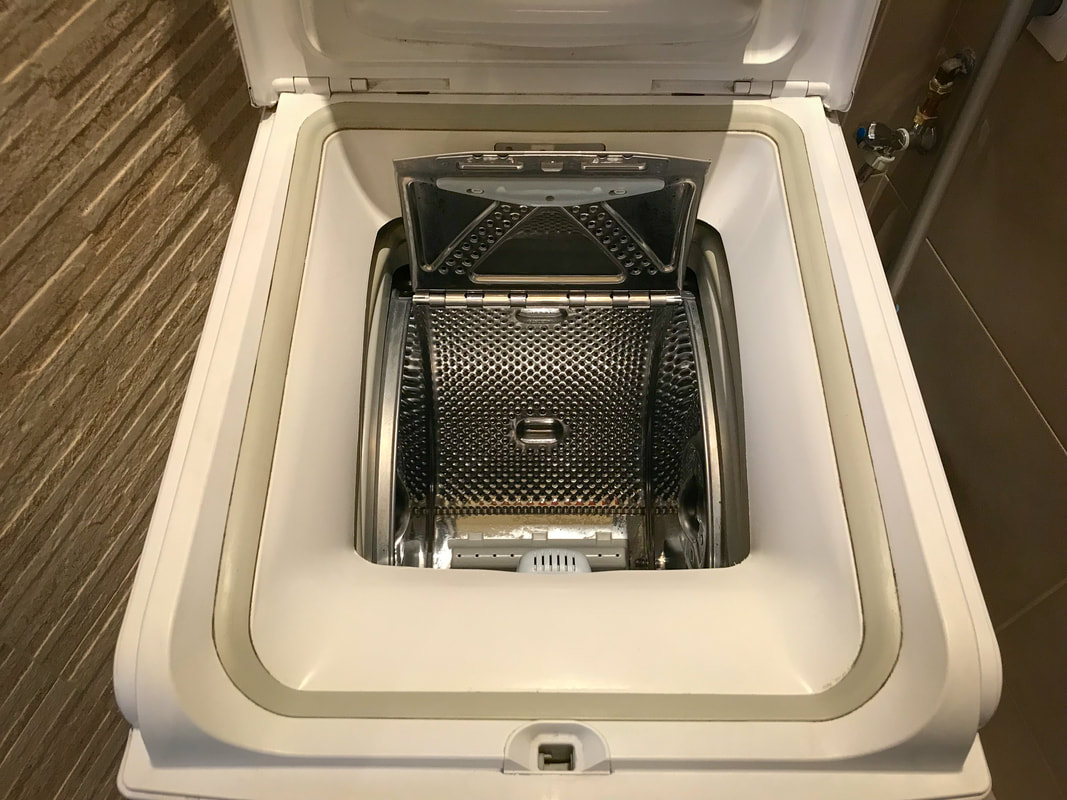 Whacky European Washing Machine / Packing Tips from 161 Days on the Road / Karen McCann / EnjoyLivingAbroad.com