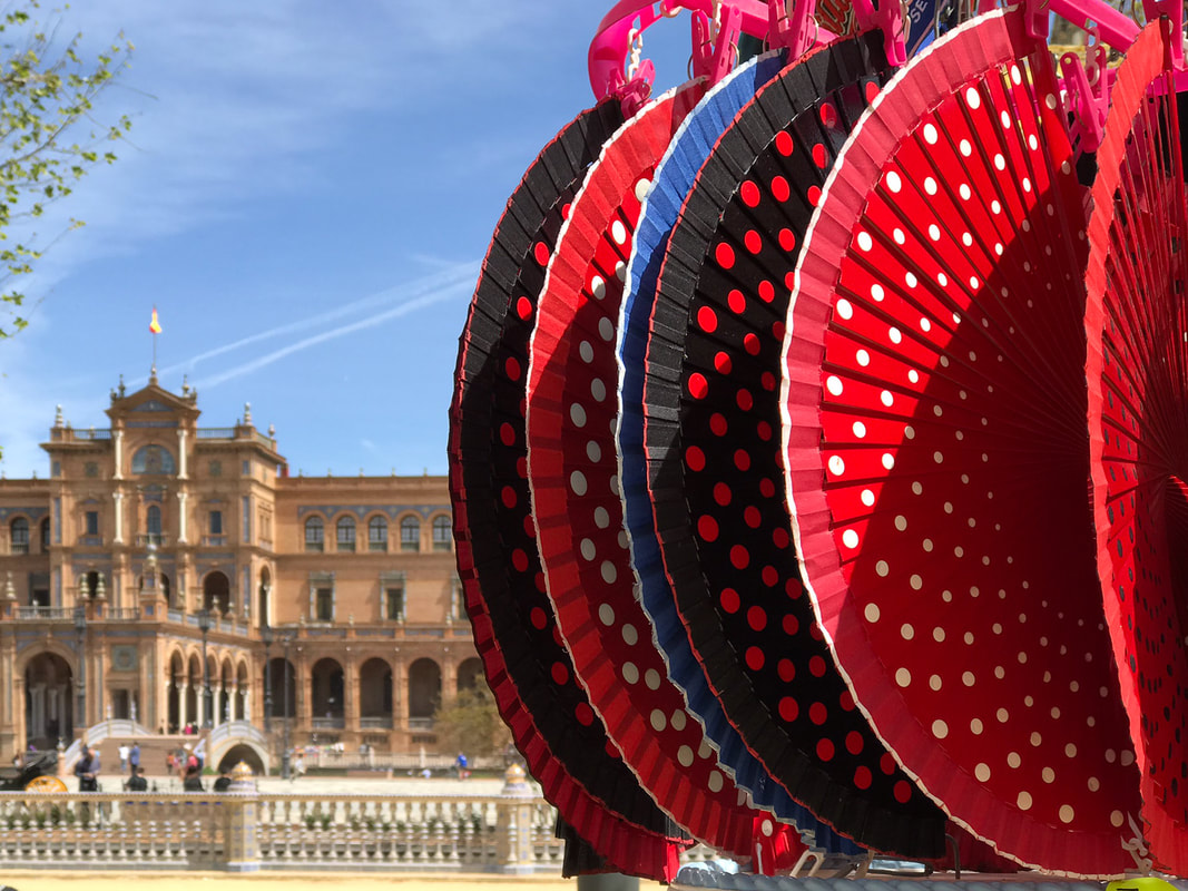 Fans, Plaza de España, Seville, Spain / Disappointing Destinations: How to Love 'Em (Warts & All) / Karen McCann / EnjoyLivingAbroad.com