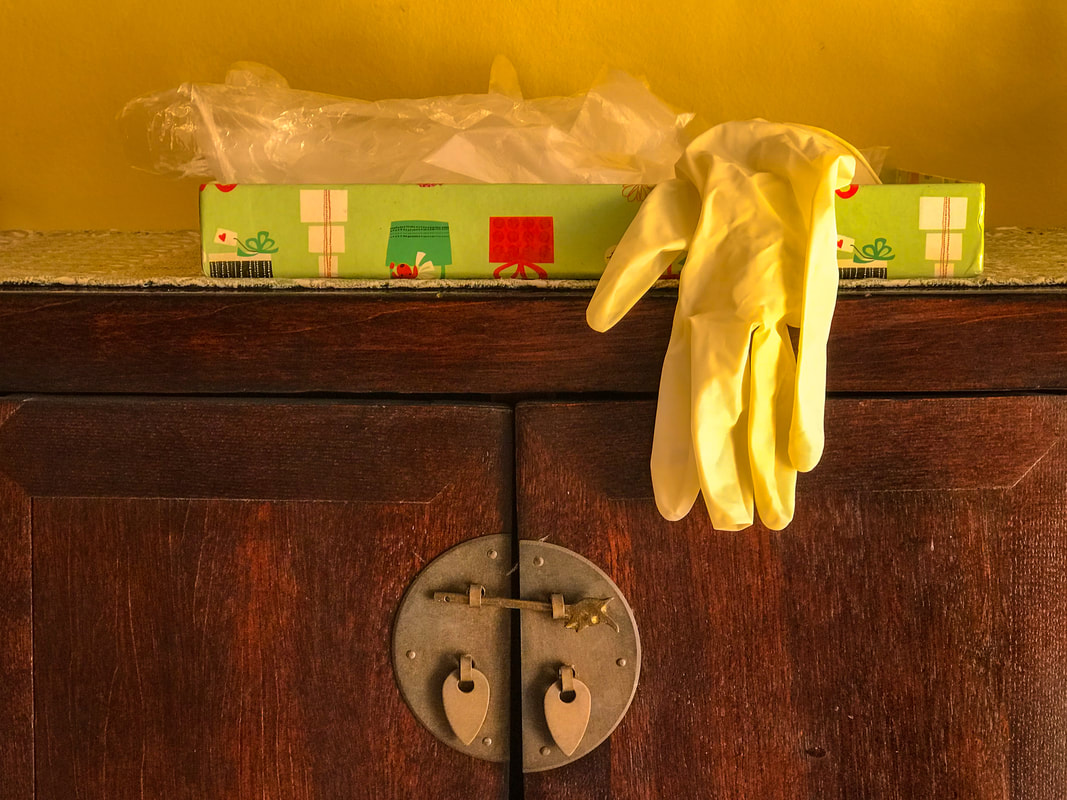 Reused surgical glove / The Pandemic: Desperate Situations, Ingenious Solutions / Karen McCann / EnjoyLivingAbroad.com