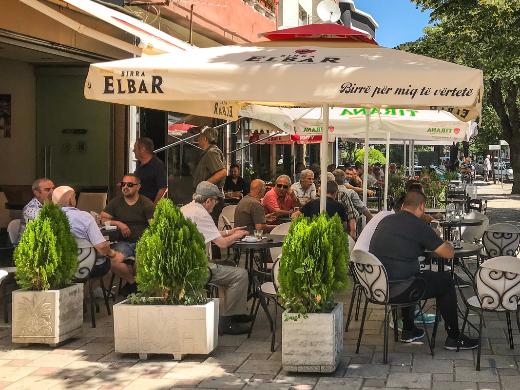 Albanian coffee house / Men's coffee house / Karen McCann / EnjoyLivingAbroad.com