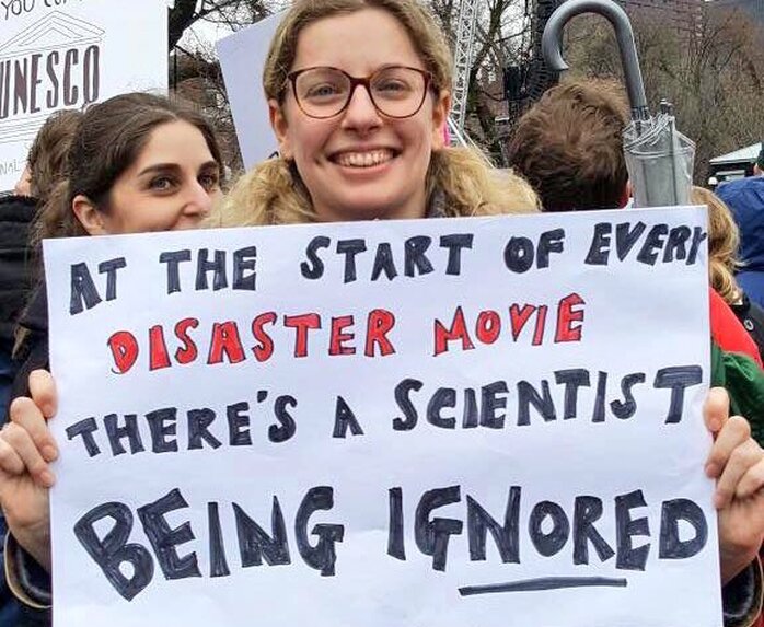 Protest poster pro-science / The Pandemic: Desperate Situations, Ingenious Solutions / Karen McCann / EnjoyLivingAbroad.com