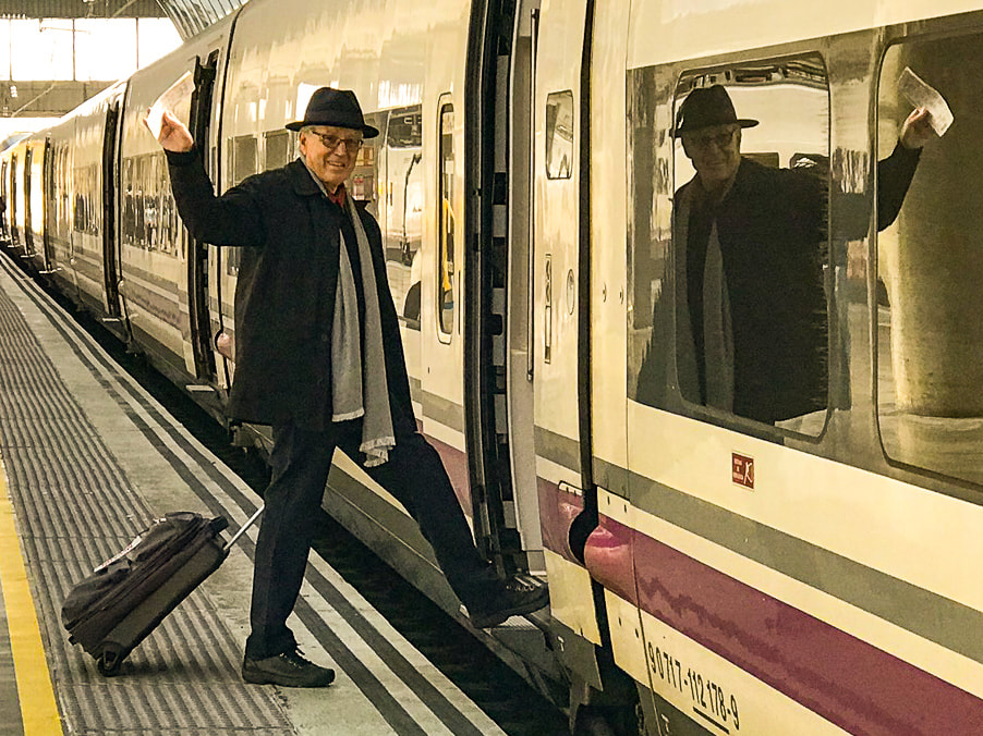 Rich in Seville train station / Packing 1 Small Carry-on for 4 Months on the Road / Karen McCann / EnjoyLivingAbroad.com