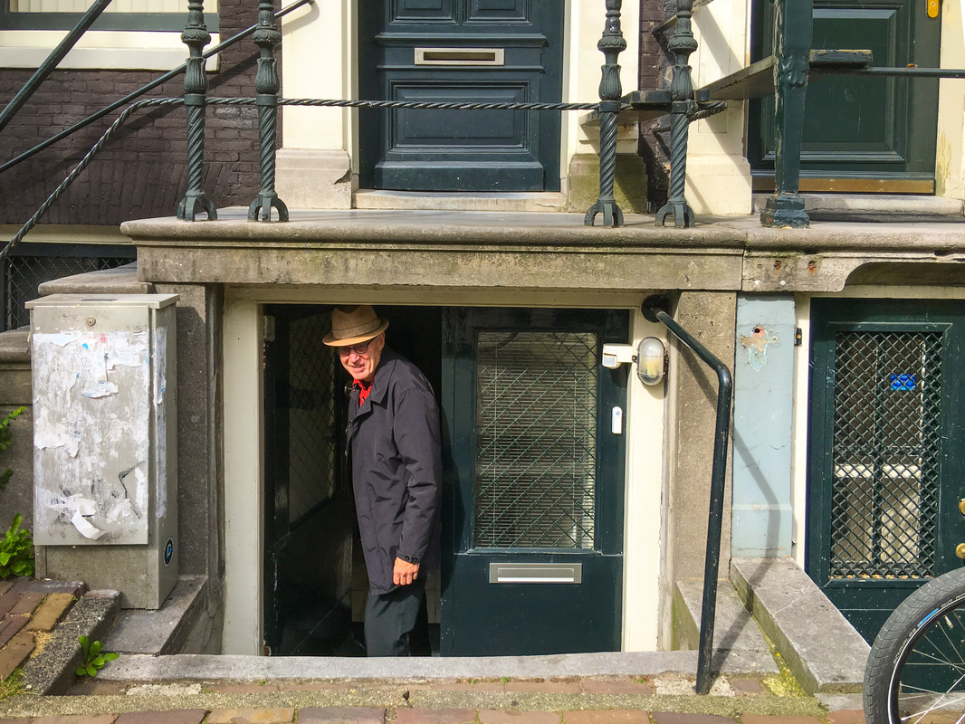 Rainy, Zany Amsterdam / living in a hobbit hole / Karen McCann / EnjoyLivingAbroad.com